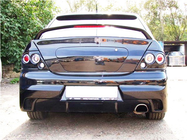 Декоративная заглушка крышки багажника в стиле EVO для Mitsubishi Lancer IX (2003-2009) купить недорого с доставкой в Бузулук